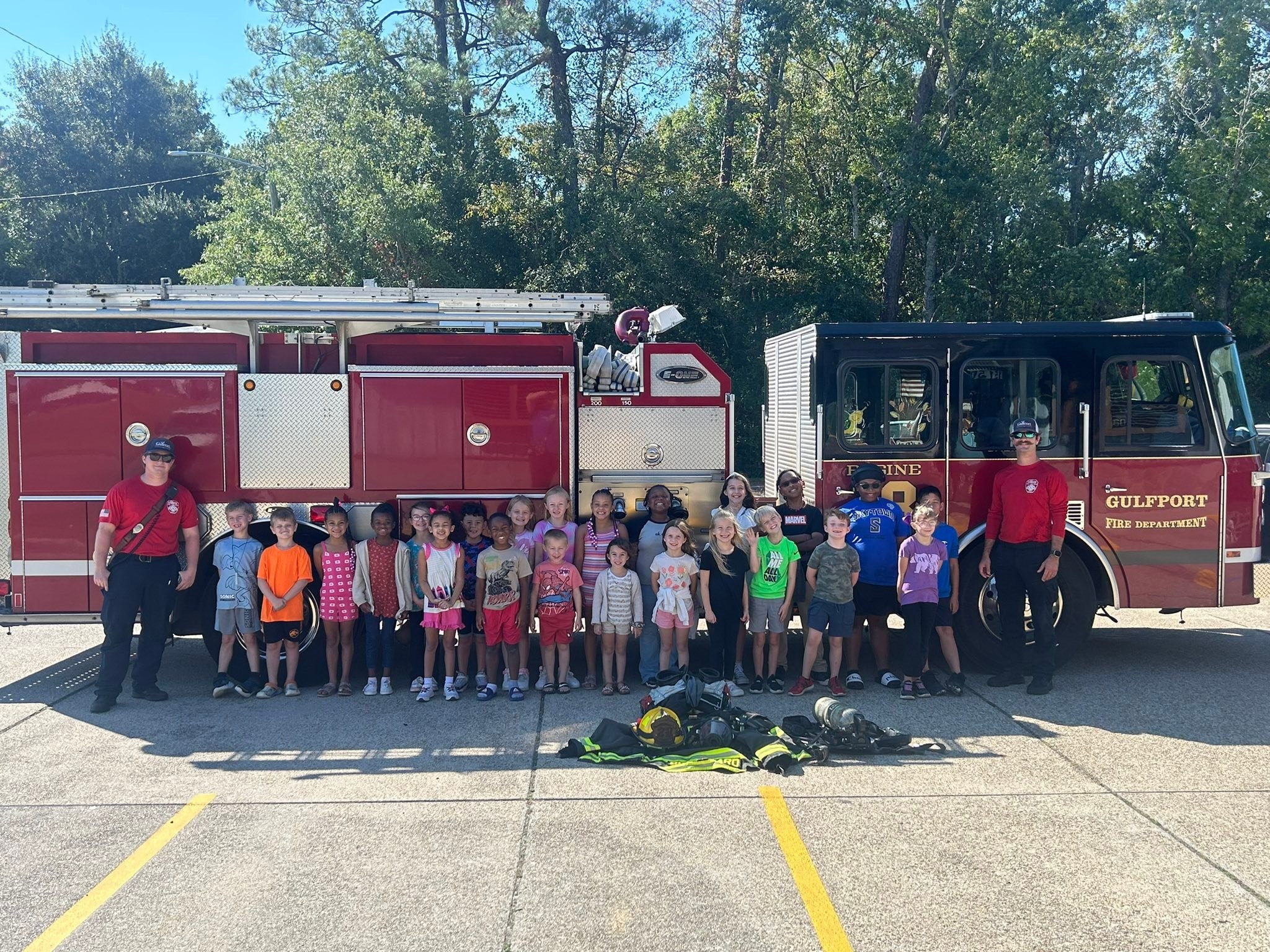 Gulfport Academy children with the Gulfport Fire Department
